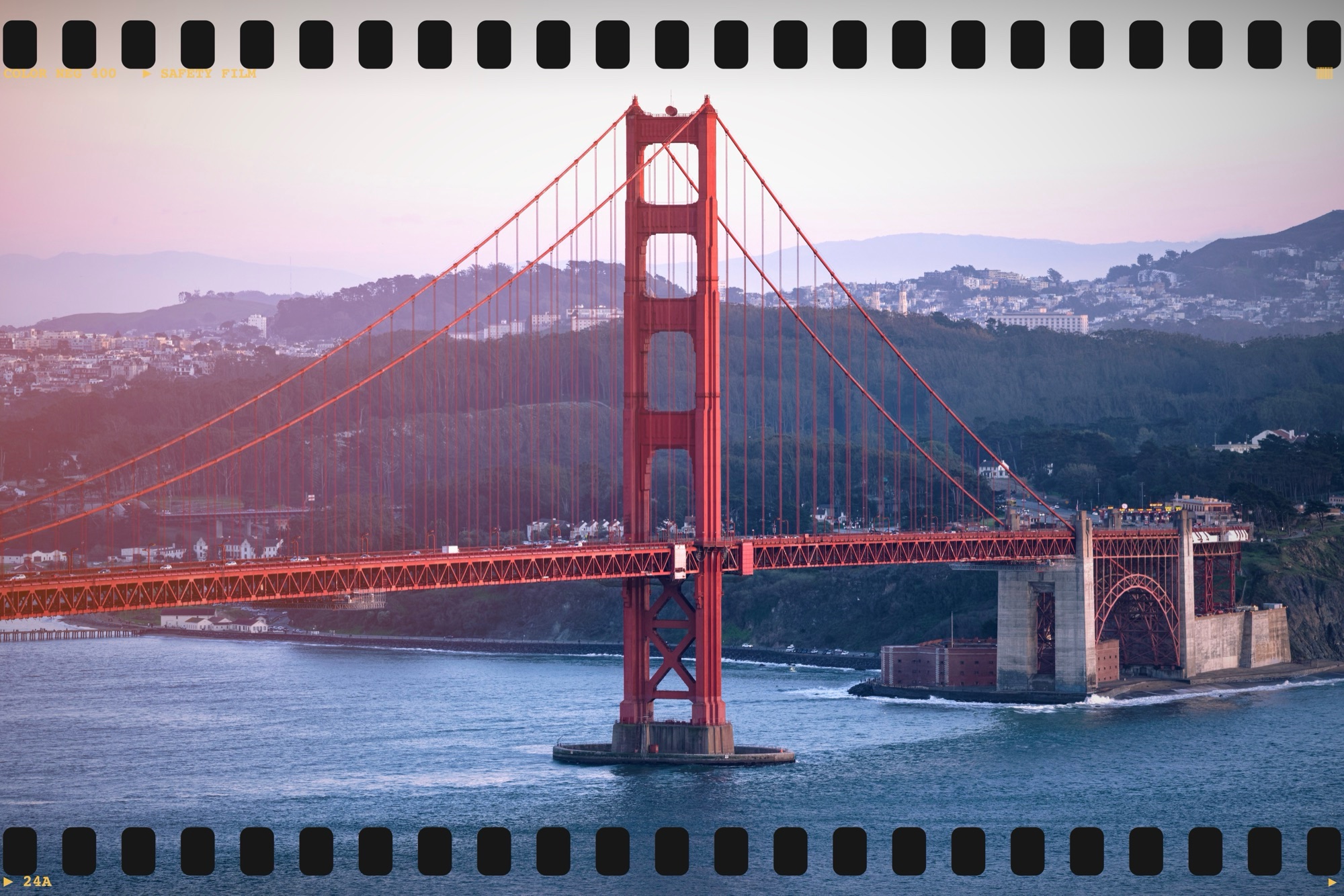 The same photo edited in LunaLux: a warm color grade and a full sprocket border